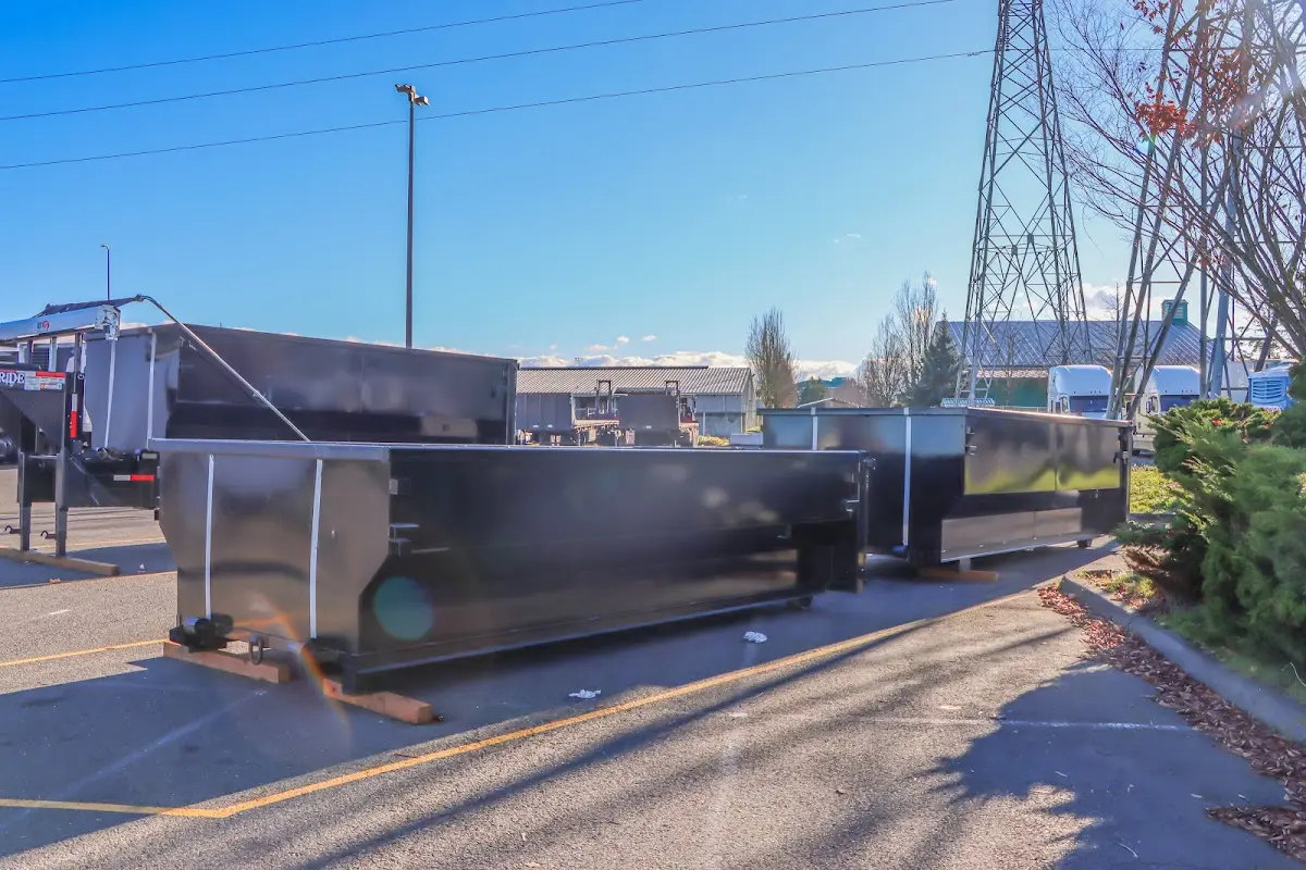 Roll-off dumpster ready for waste disposal at job site for 3 Yard Dumpster Rental in Lacombe
